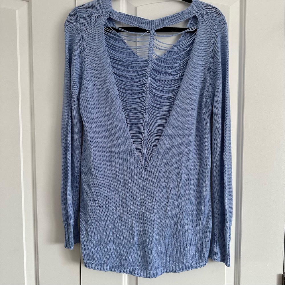 Distressed back knit sweater